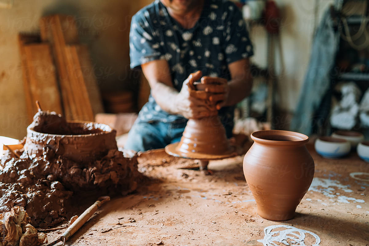 Man Working on a Ceramic Studio