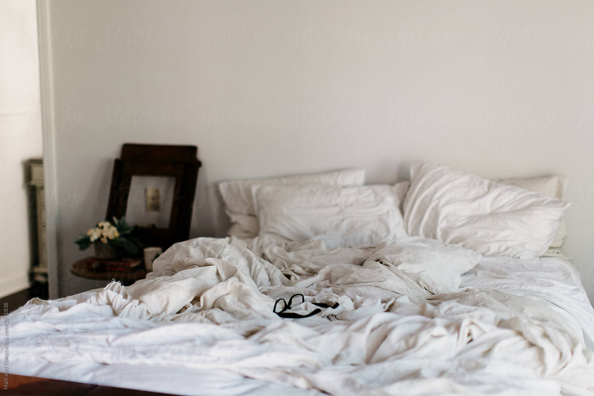Messy White Bedroom With Black Glasses By Stocksy Contributor Latisha Lyn Photography Stocksy 