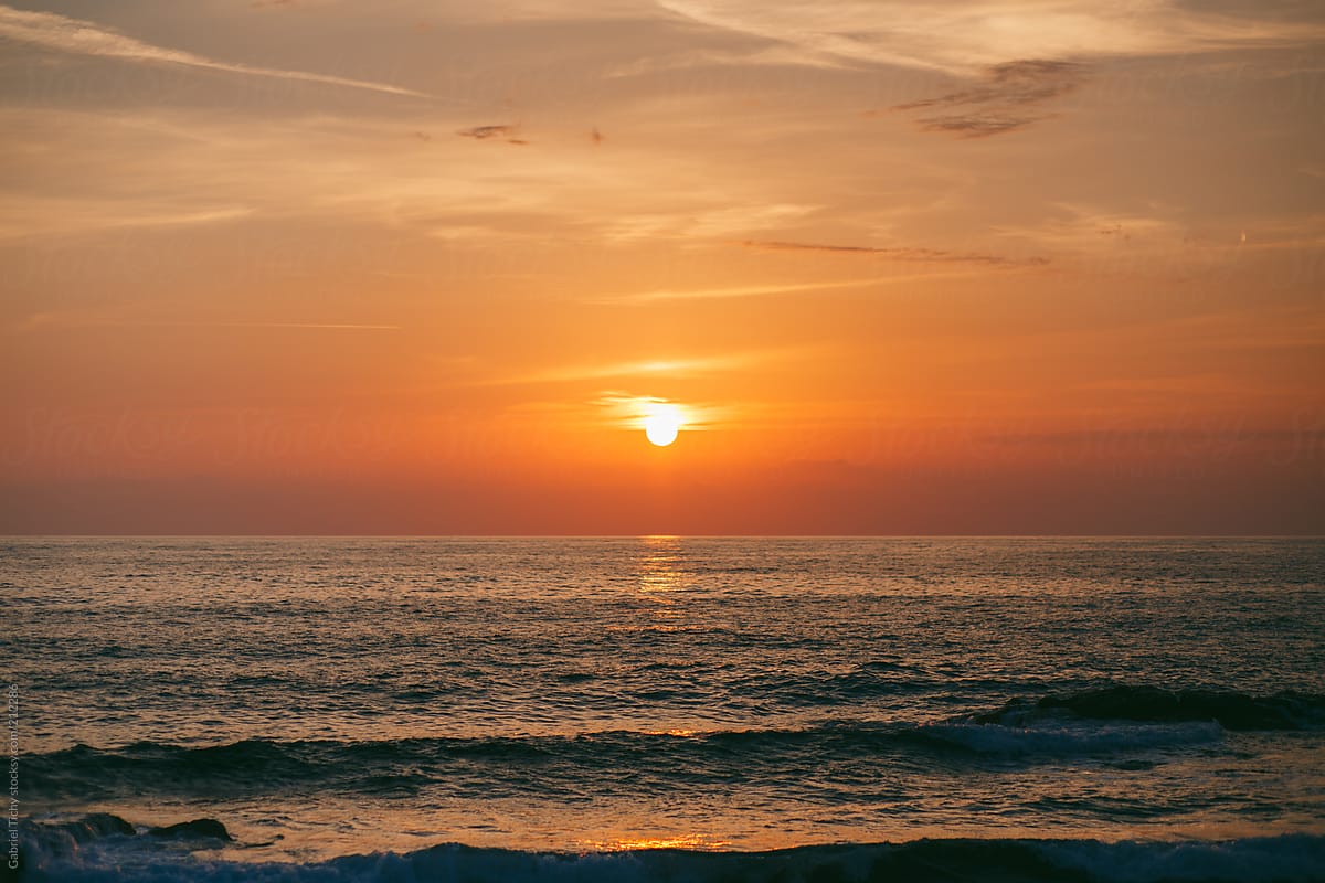 Colorful sunset on endless sea horizon