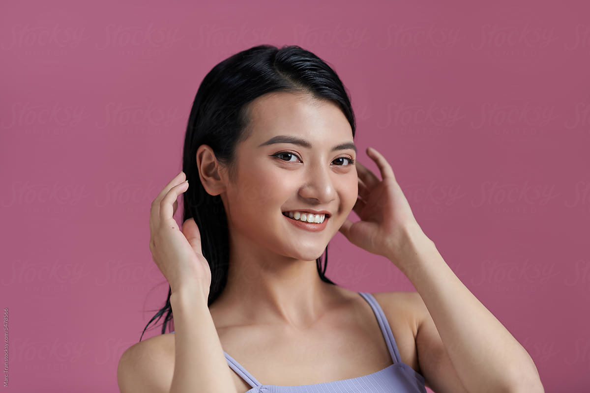 Young Beauty Woman With Clean Fresh Glowing Skin. Beautiful Girl