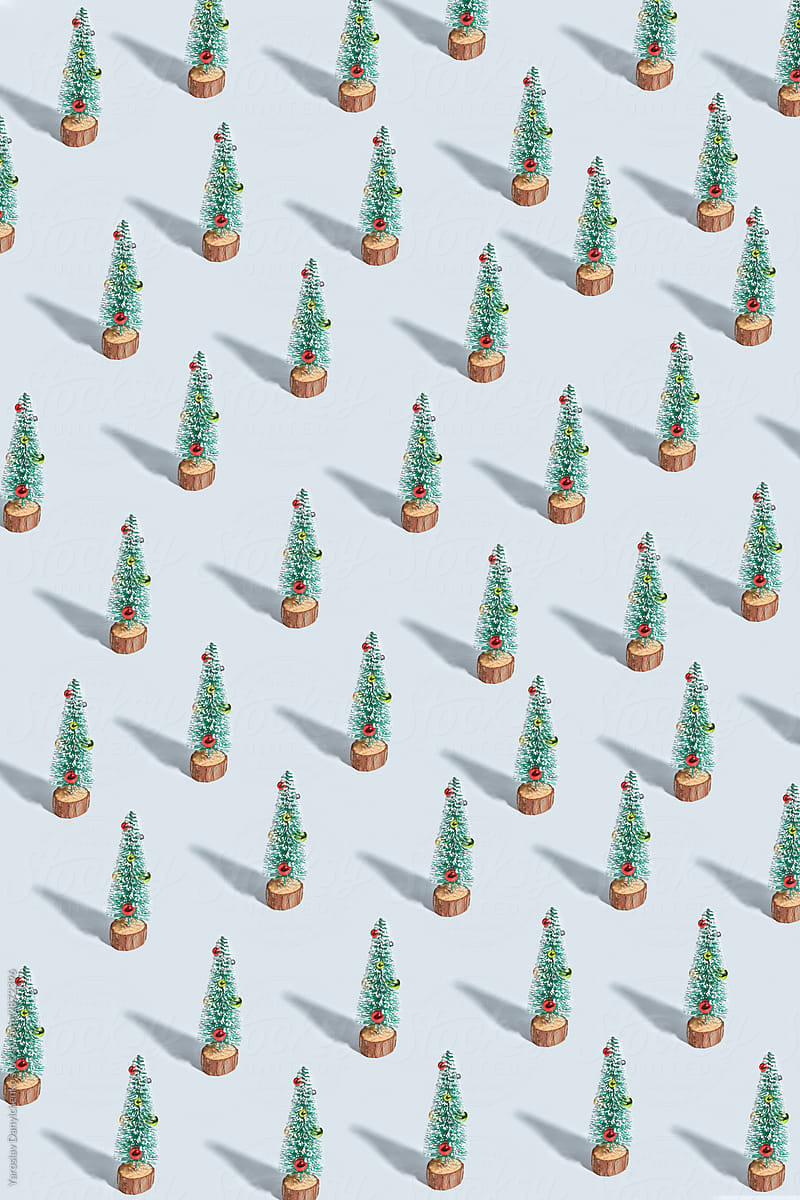 Christmas pattern from artificial trees with shadows.