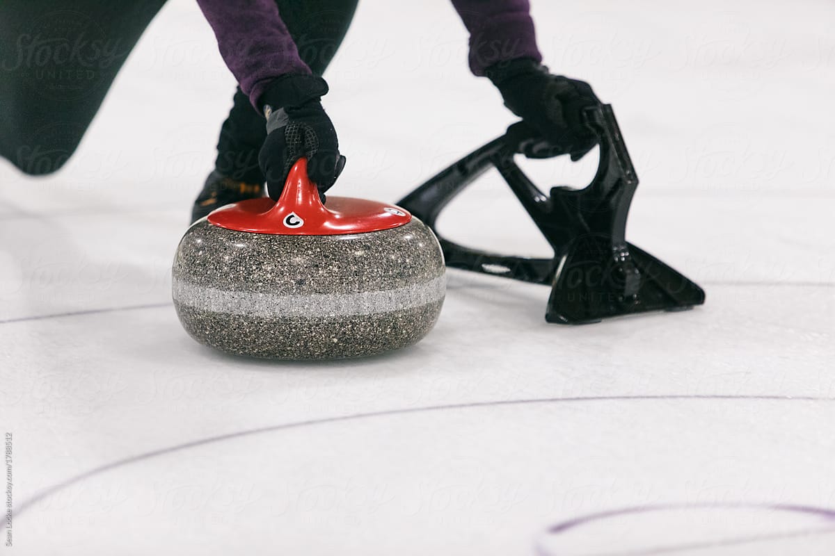 Curling: Female Thrower About To Release Stone