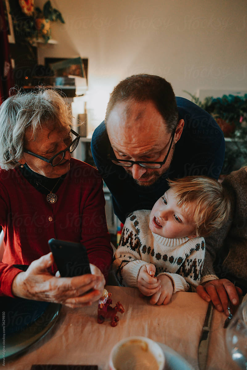A family make a video call with greetings on Christmas