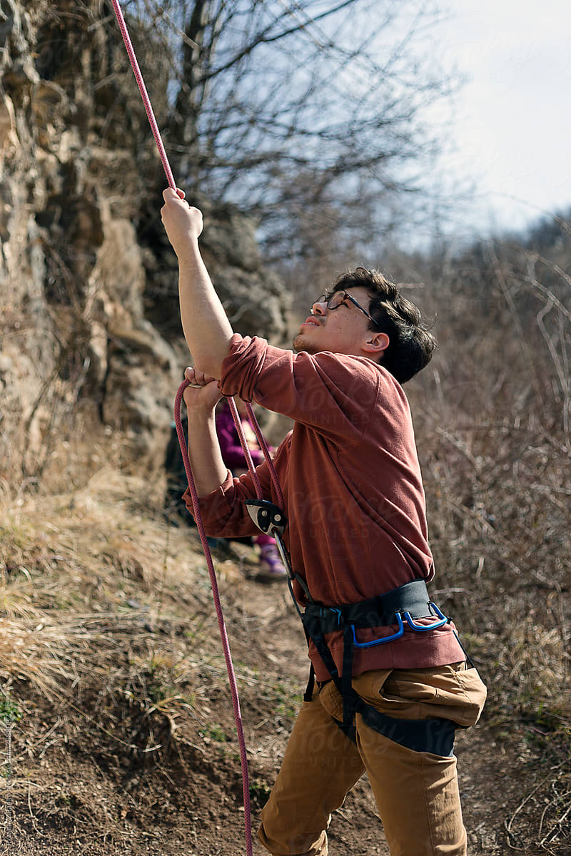 Belaying a lead rock climber