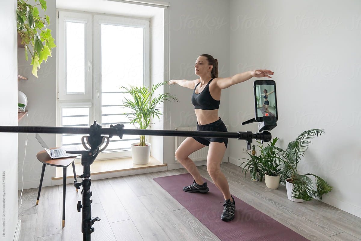 Woman Streaming Her Workout From Home