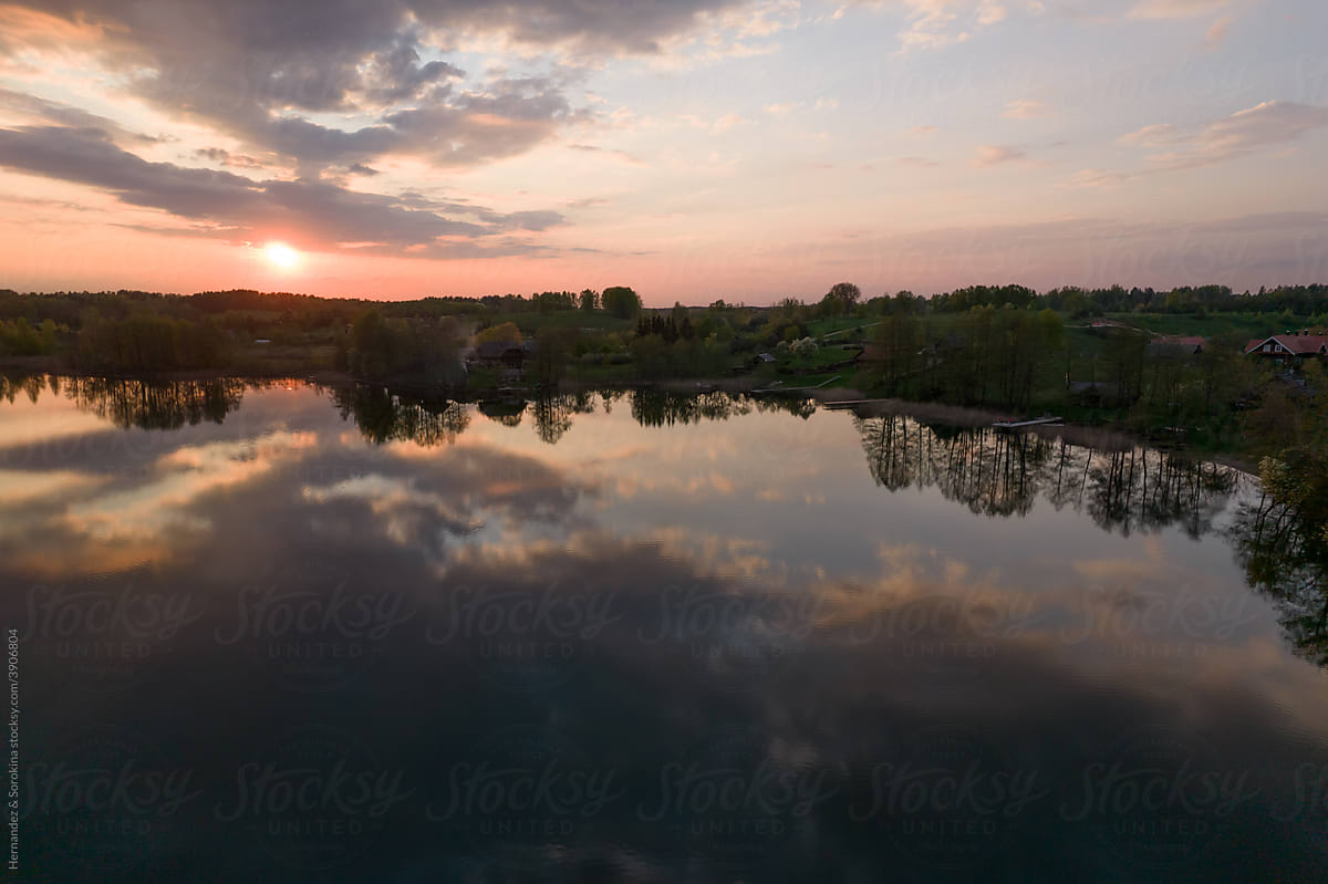 Lake Reflection At Sunset