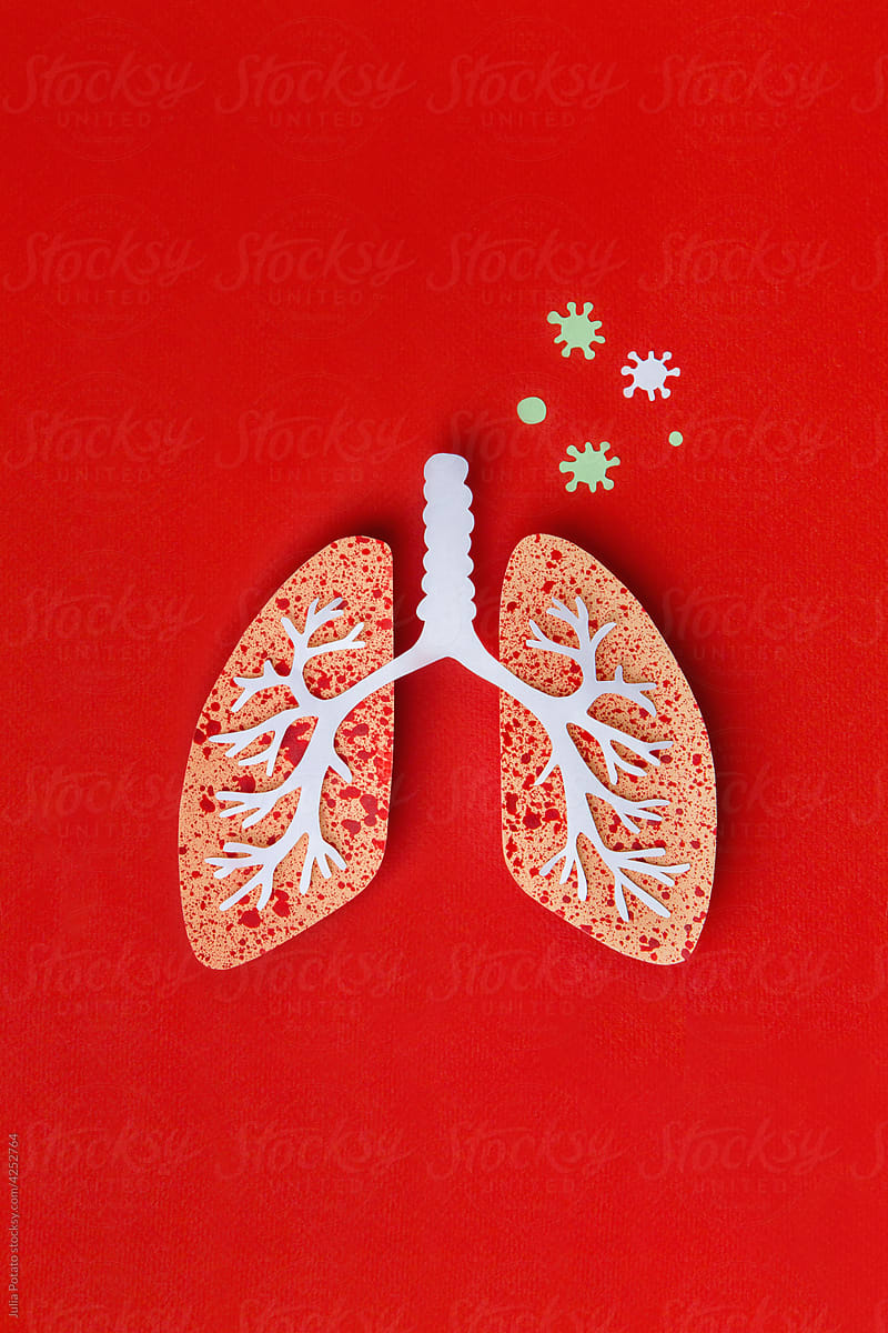 Paper craft lungs with virus on red background