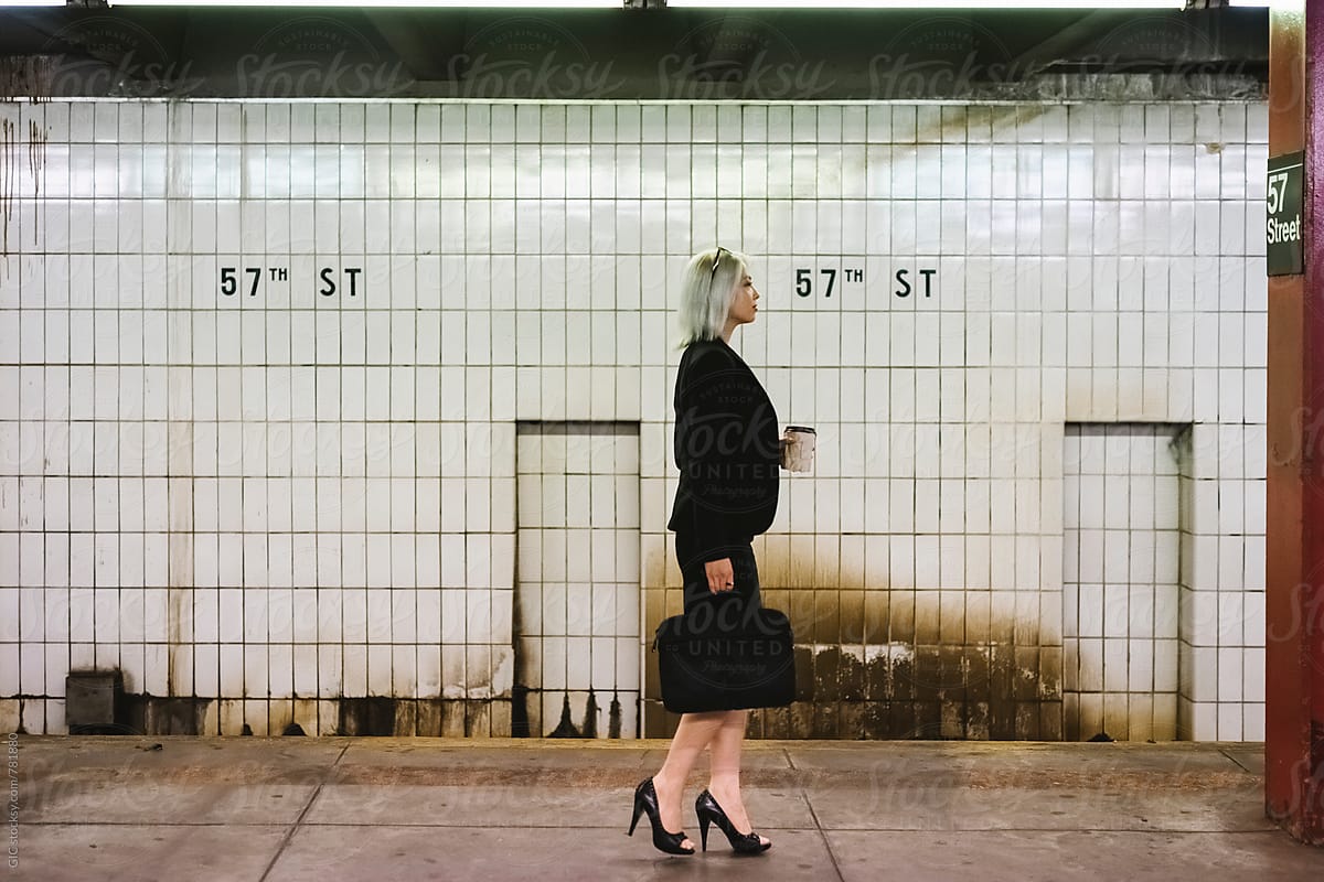 Businesswoman in NY subway