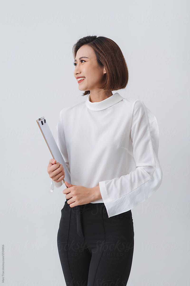 Modern asian business woman holding folder