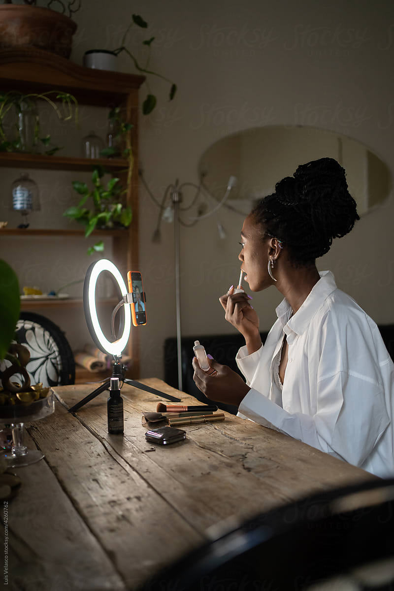 Profile Of Black Girl Making Up At Home By Stocksy Contributor Luis