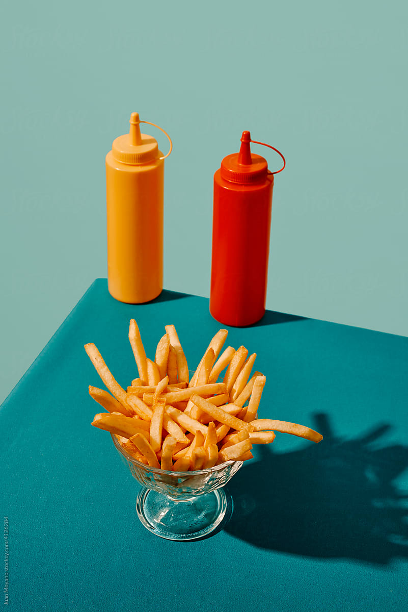 french fries, mustard and ketchup