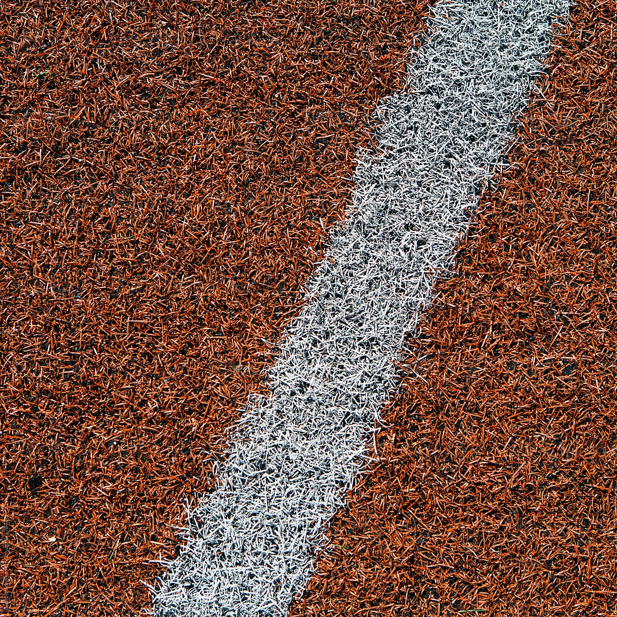 Boundary lines on artificial turf sports field