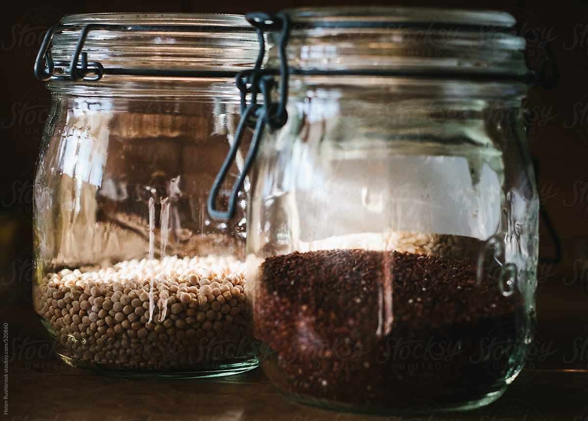 Quinoa and wholegrain giant cous cous in glass jars.