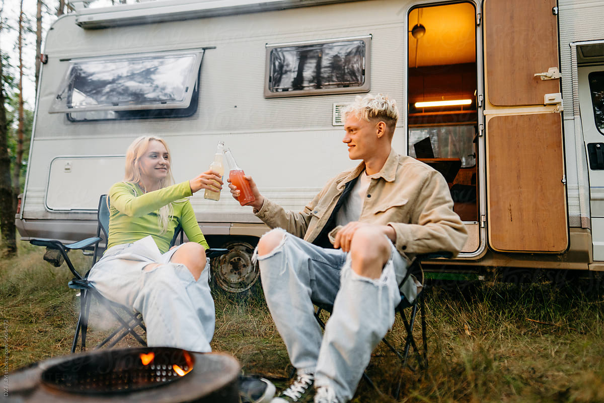 A man and a woman travel by RV