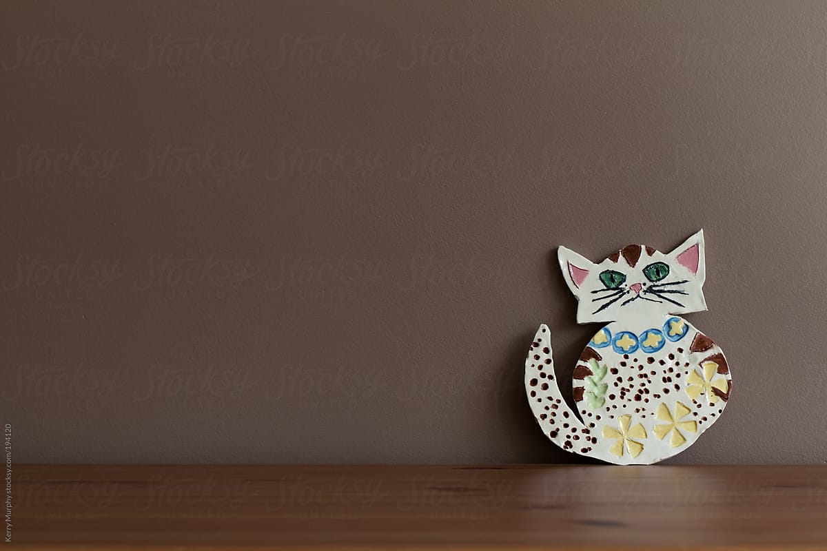 Colorful hand-painted handmade ceramic cat