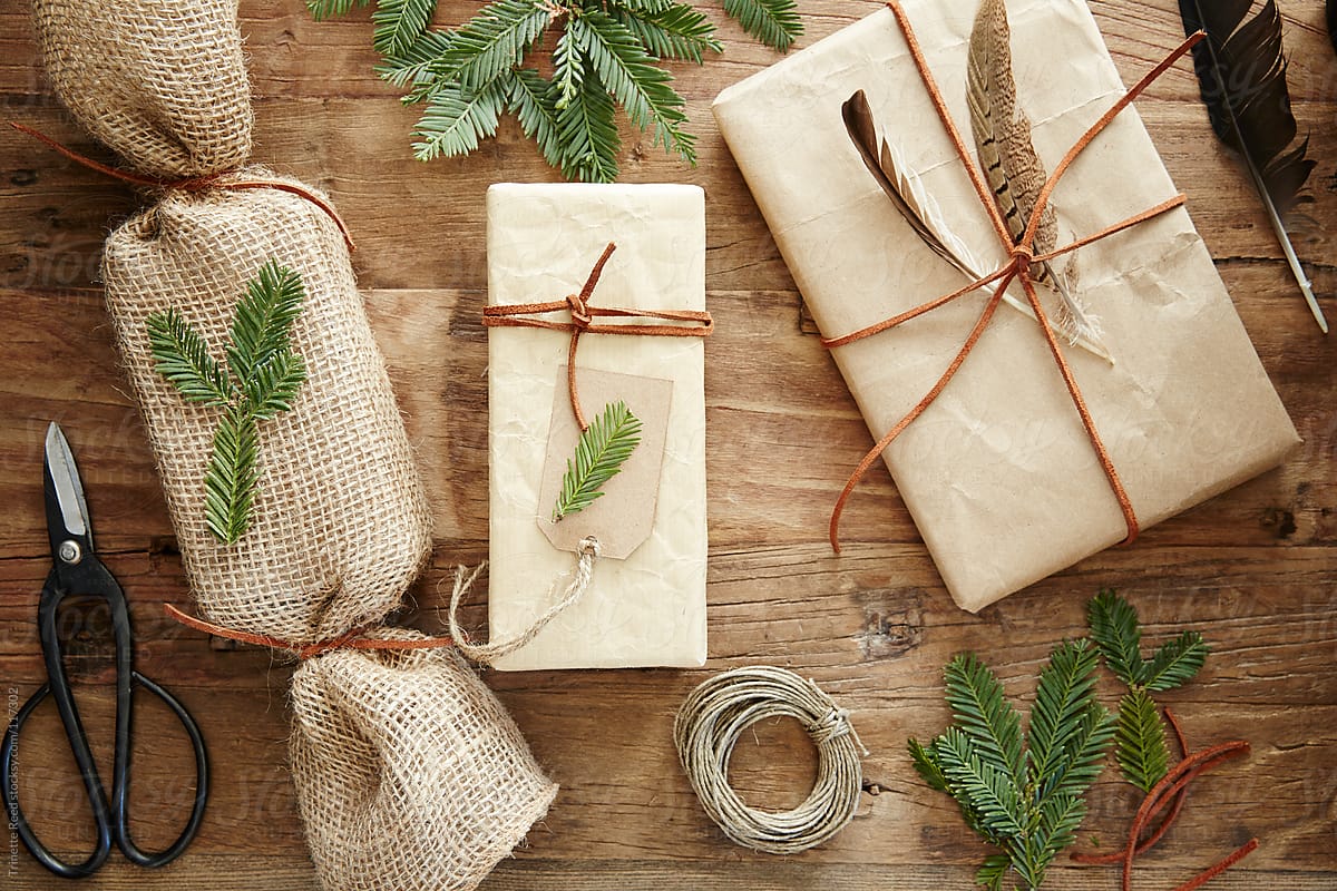 Still life of homemade wrapped christmas presents with nature elements