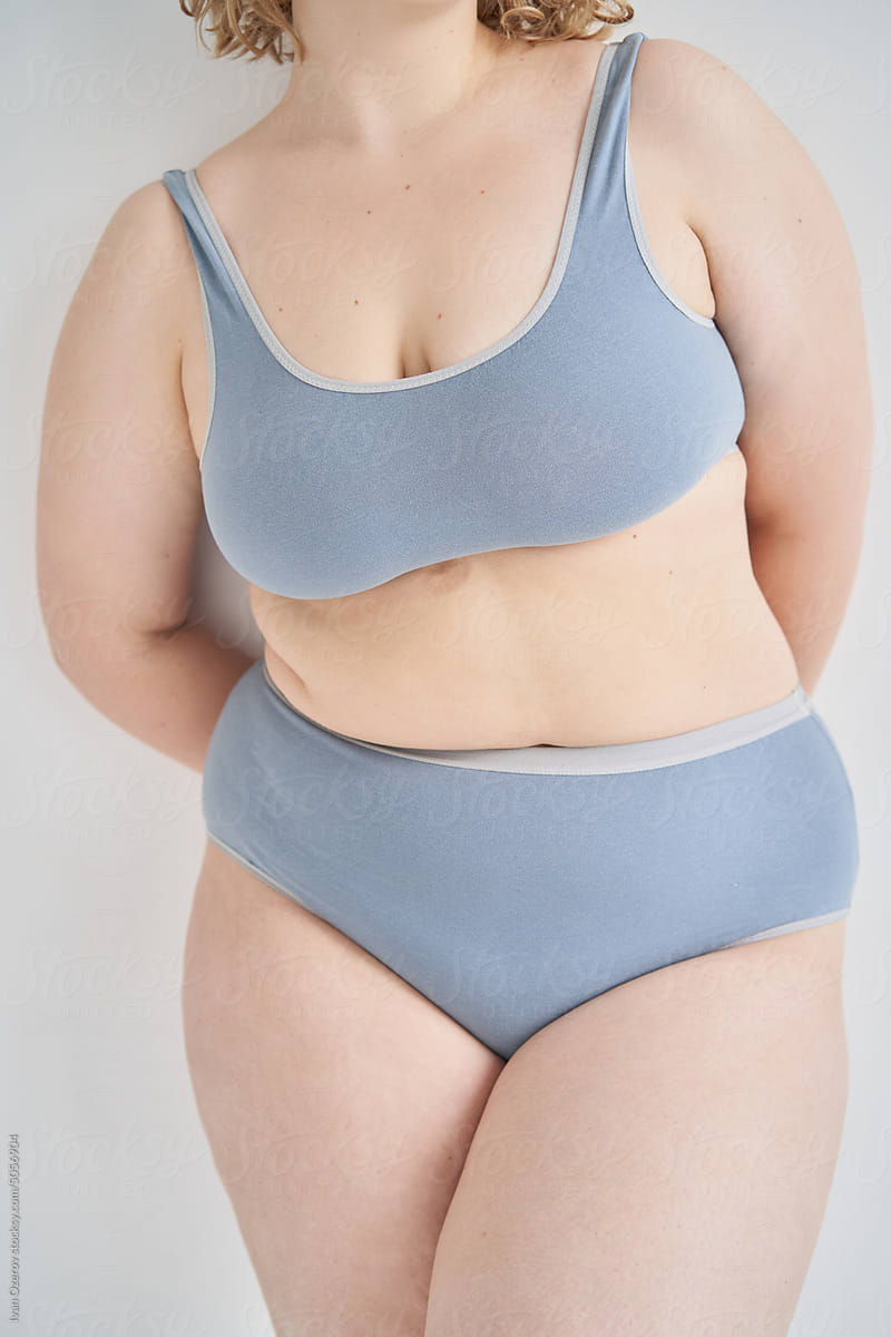 Crop curvy woman in gray underwear