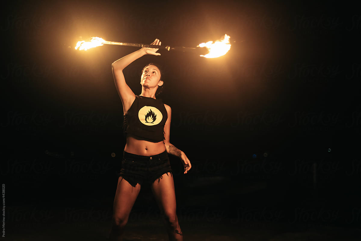 woman juggling fire