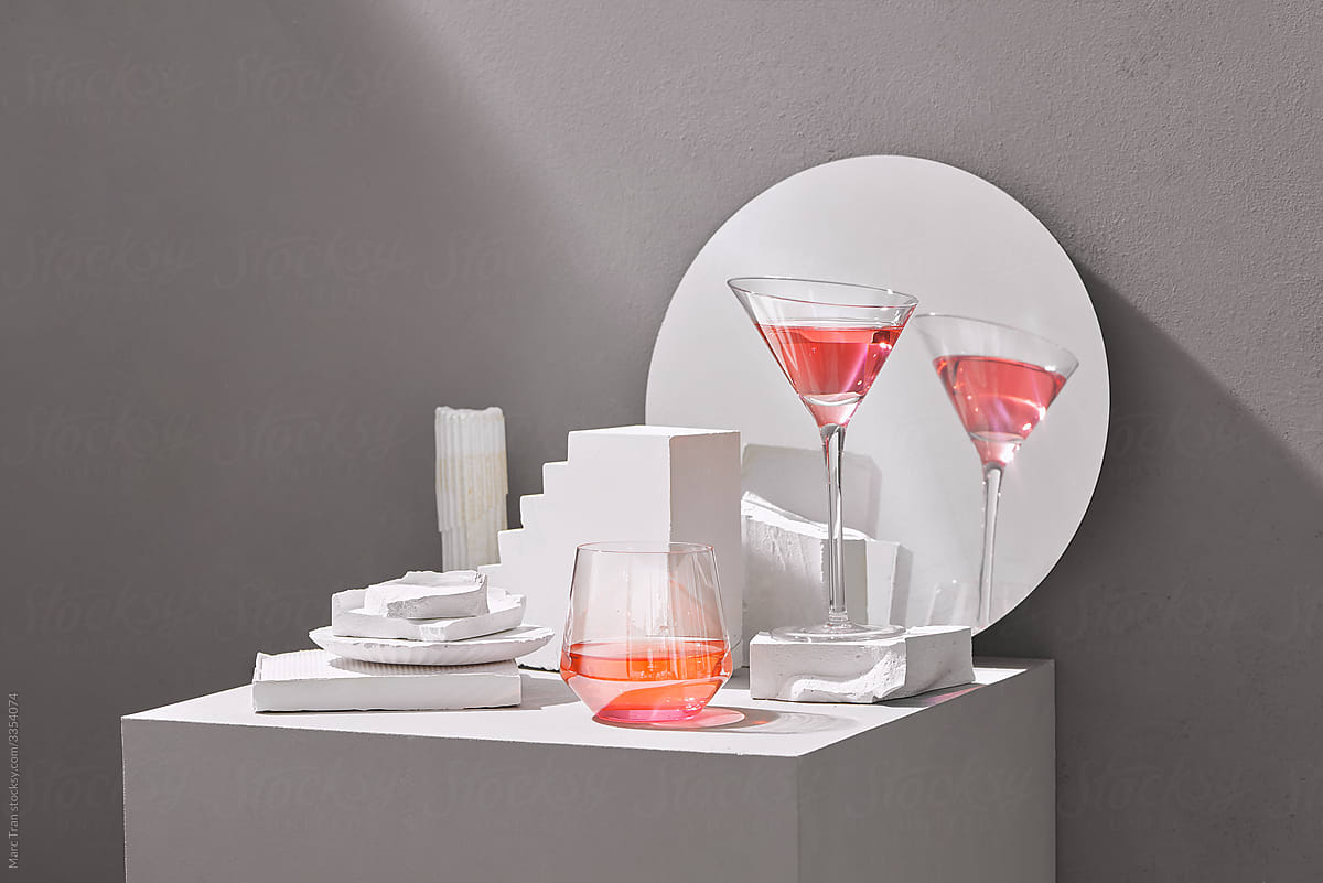 Cube with cocktail glasses with miniature concrete