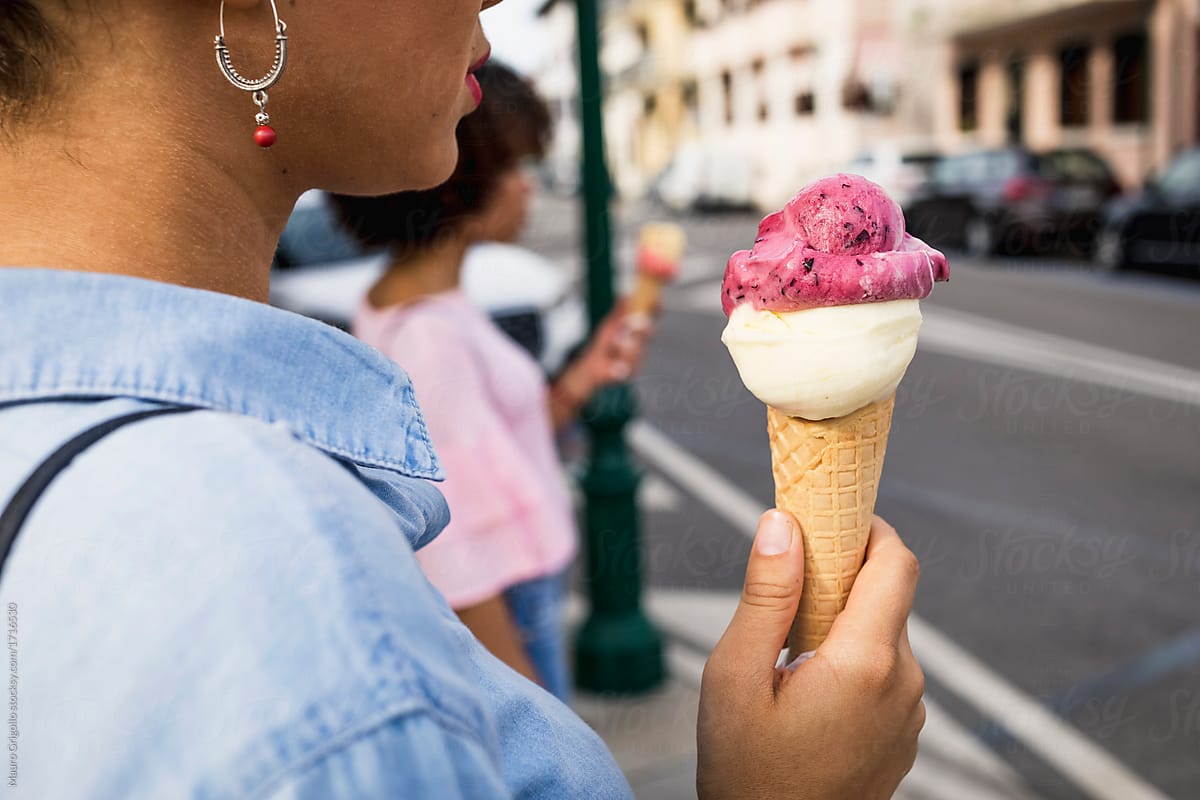 Women eating ice cream in the city