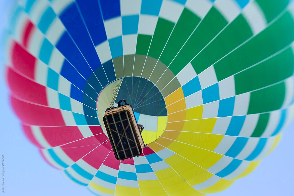 Bottom of a colorful hot air balloon in the air