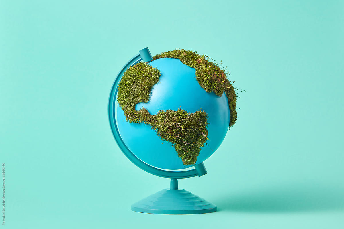 Earth globe with green moss