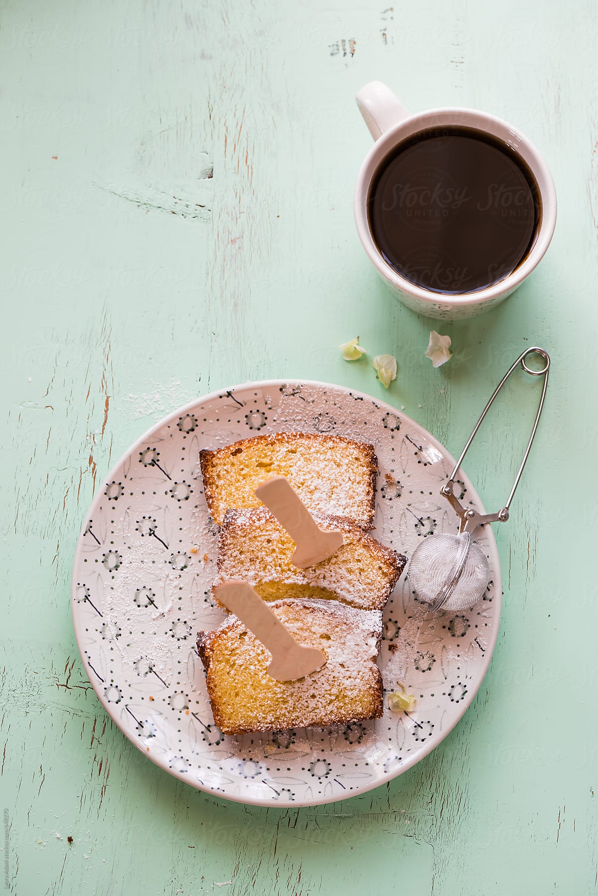 Cup of coffee and slices of cake on a dish