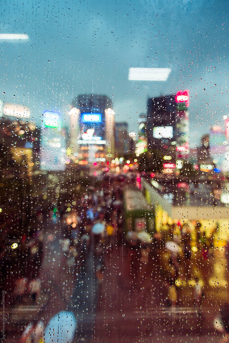 Rain drops and city background