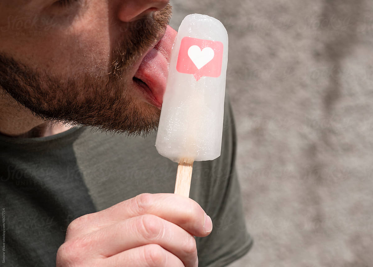 Man licks ice lolly with likes icon
