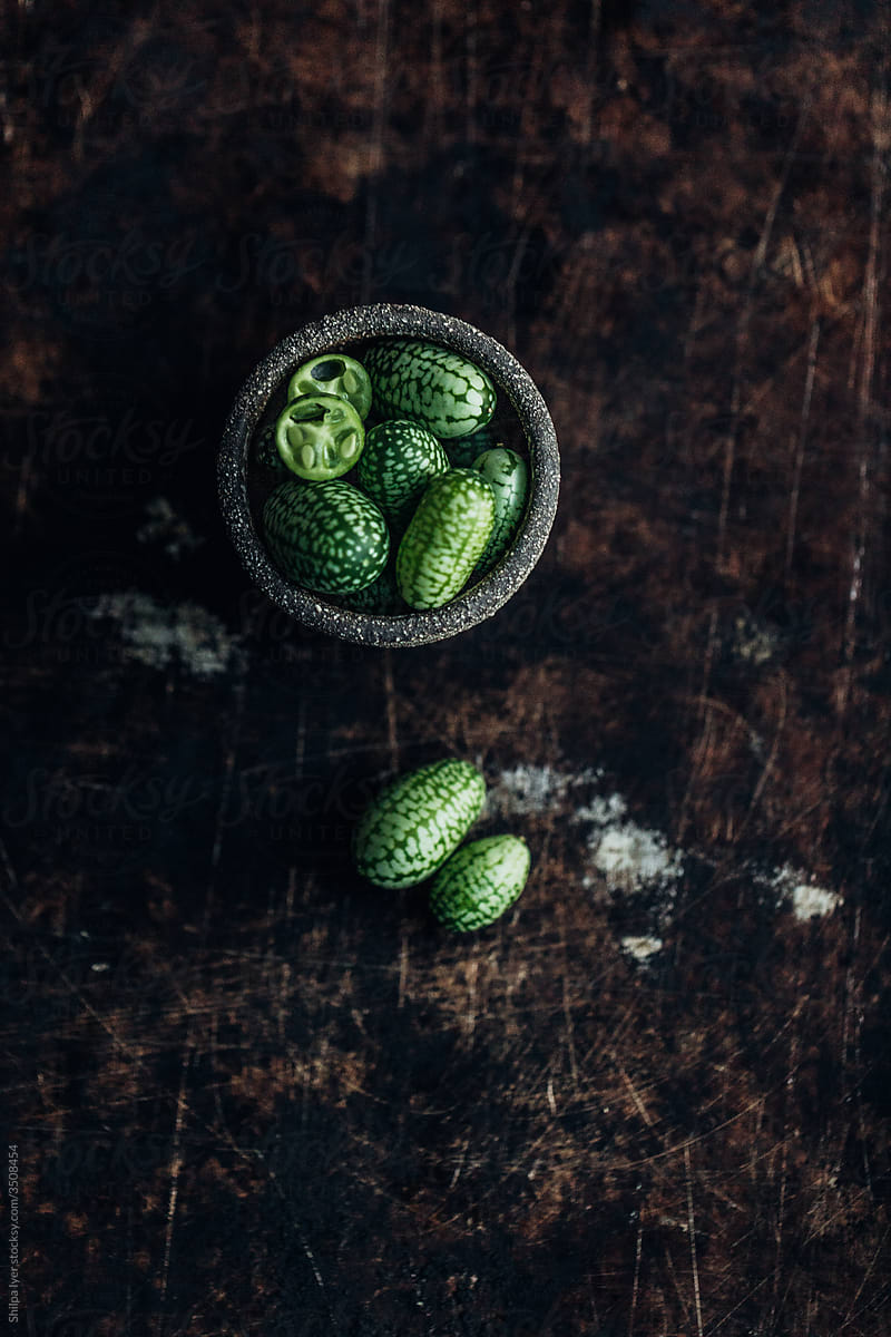 Tiny cucamelons in bowls