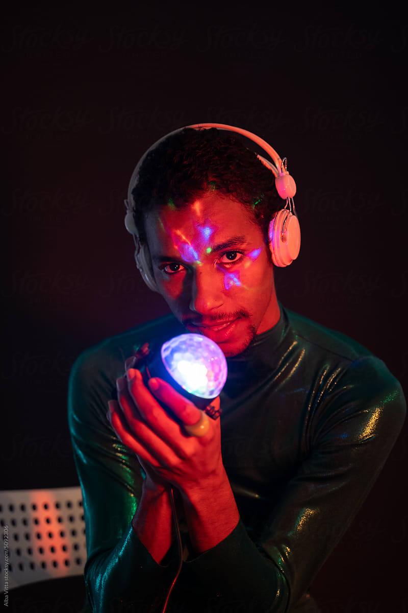 Neon light man portrait with headphones