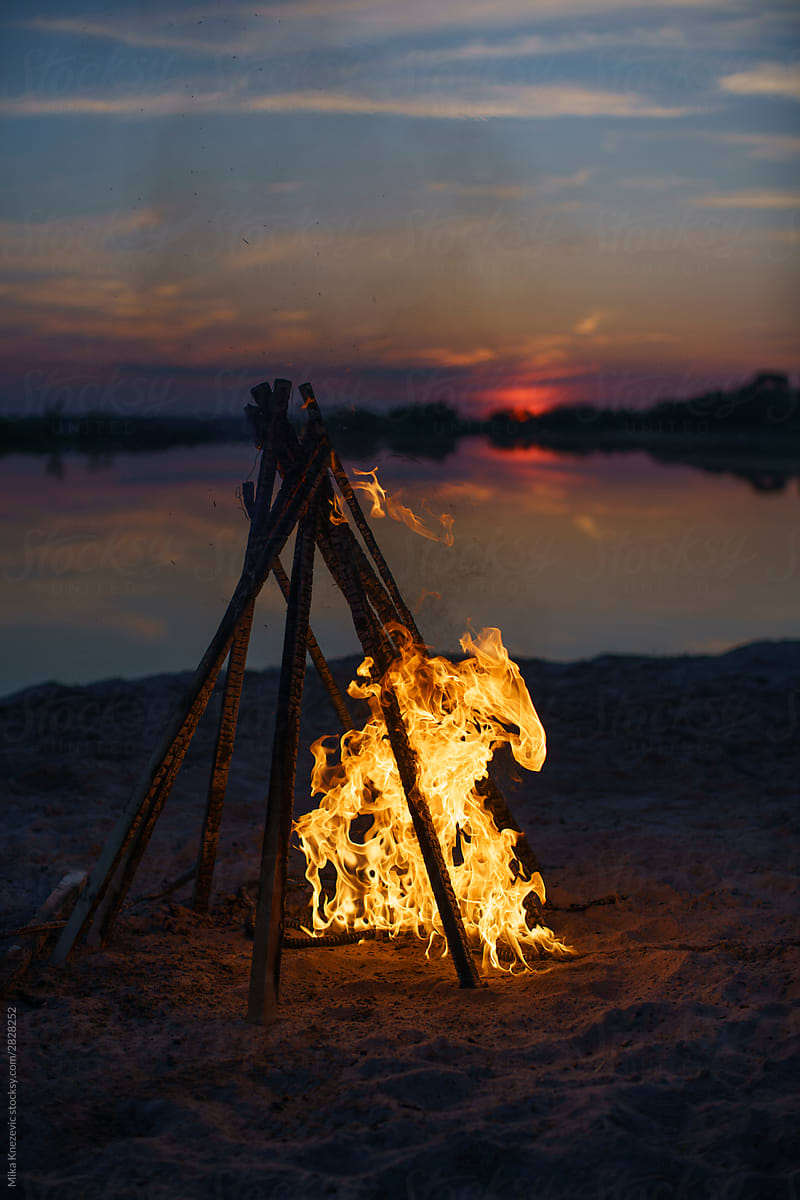 Bonfire at Sunset by the Lake