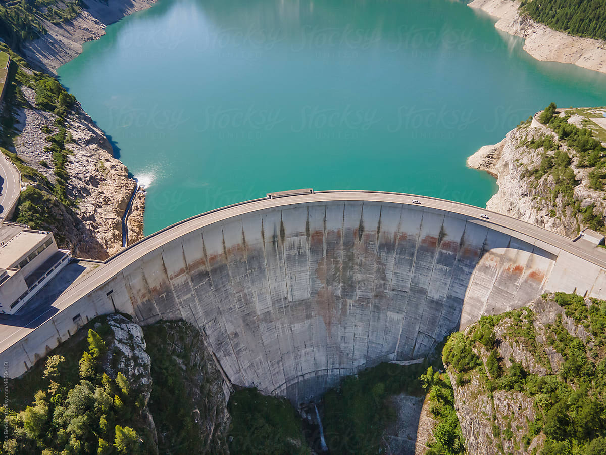 renewable energy, water dam in Alps, France, with copyspace