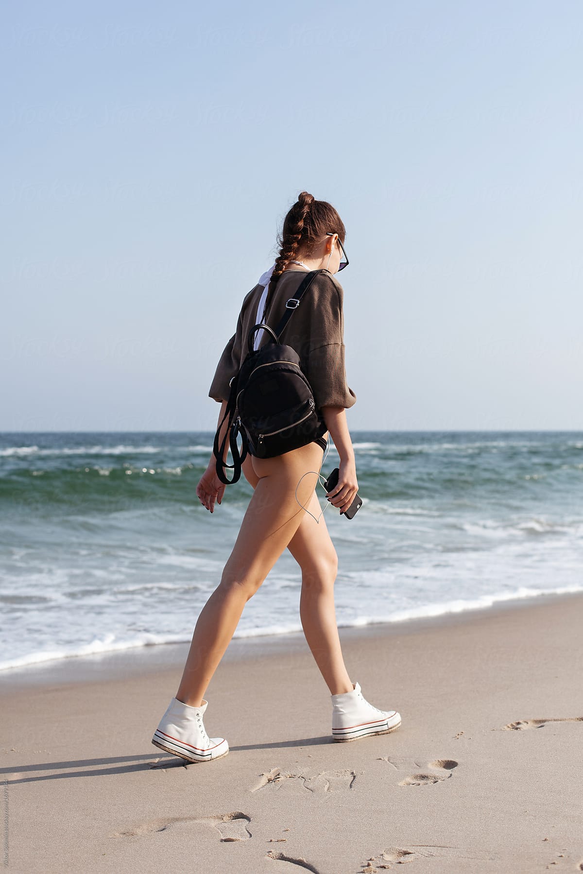 Young Sport Style Pretty Girl Have Fun On The Beach By Stocksy Contributor Viktor Solomin
