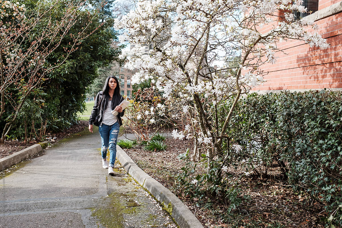 Asian College Student Walking in School