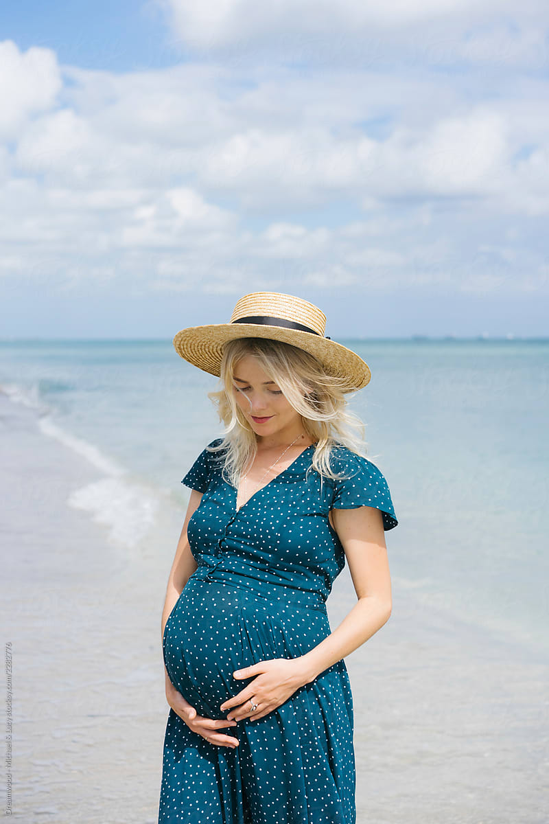Pregnant Woman Touching Belly Near Sea Del Colaborador De Stocksy Dreamwood Photography