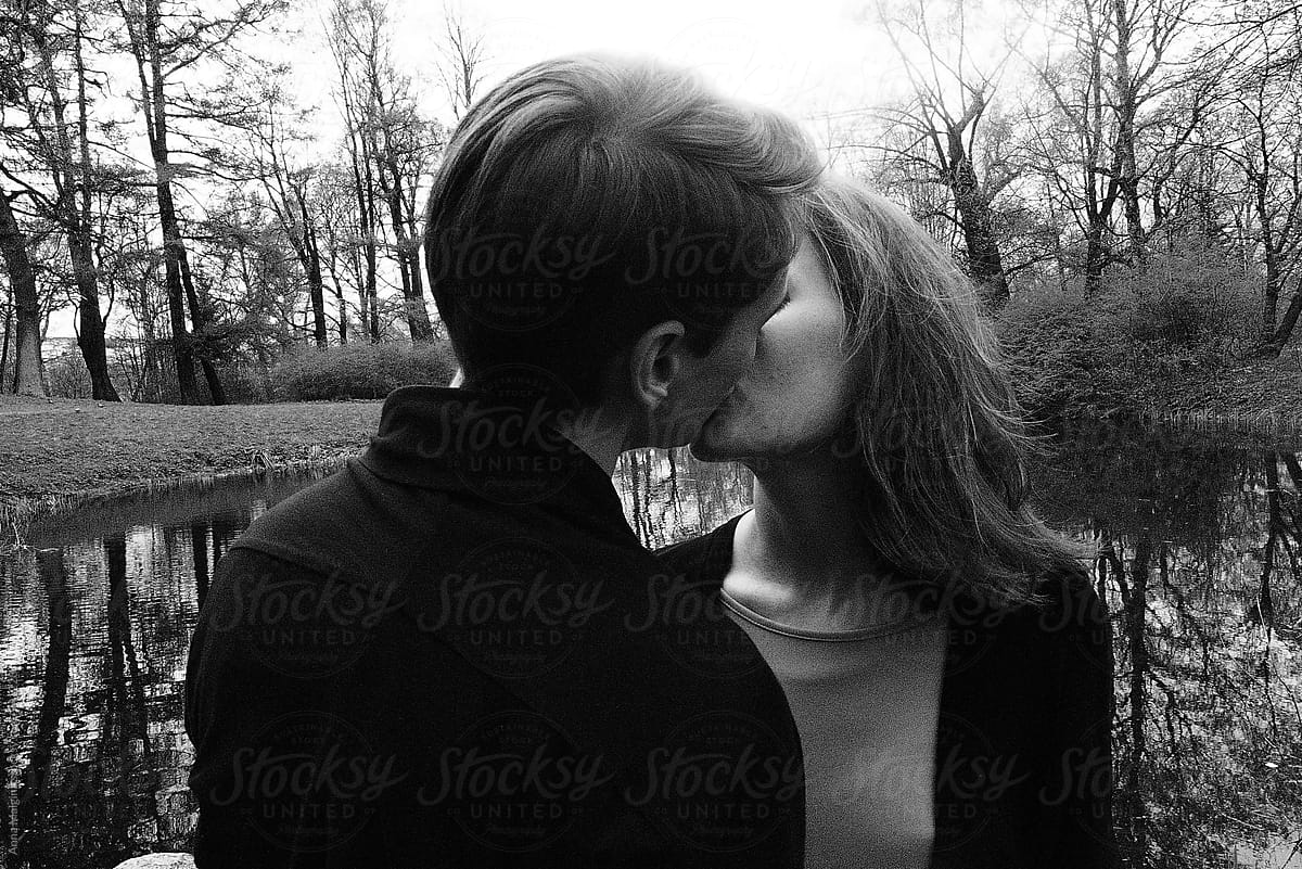 A Beautiful Couple Kissing Nearby Lake Del Colaborador De Stocksy Anna Malgina Stocksy