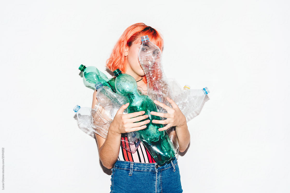 Woman with plastic bottles