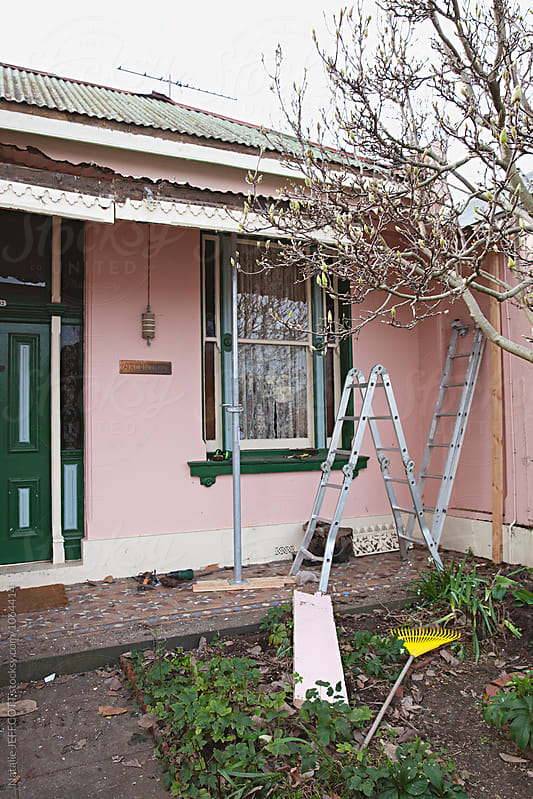 front exterior of a home undergoing renovation / repair