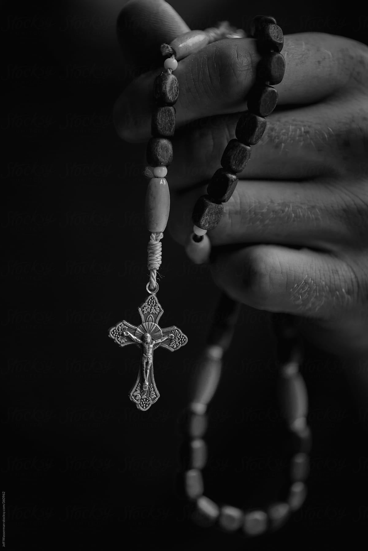 Hand Holding Rosary