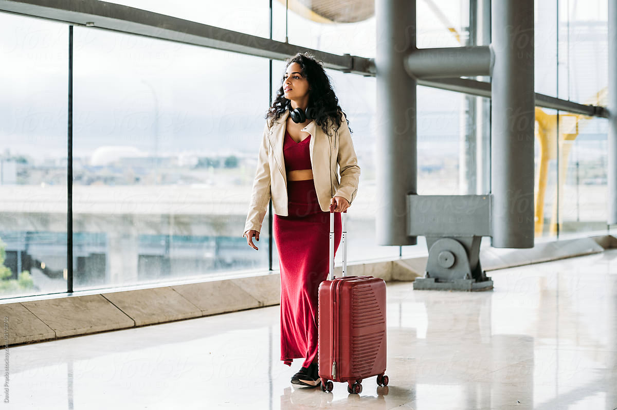 Woman with suitcase in airport