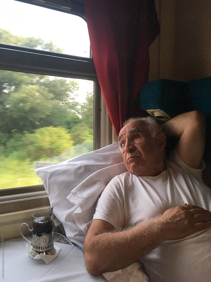 Senior man in a train