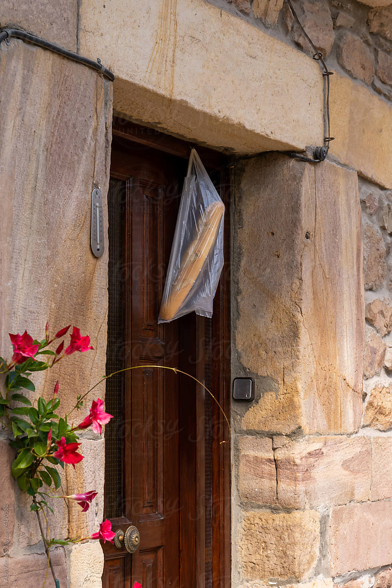 Detail of bread bag hanging from village house door