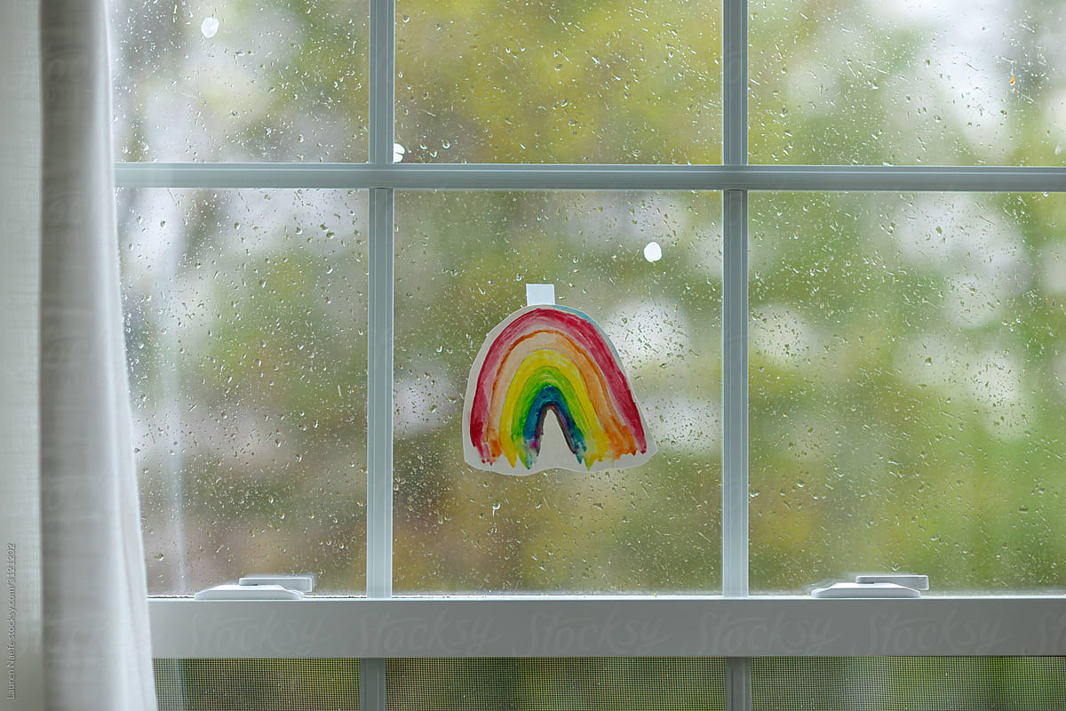 Rainbow taped to window