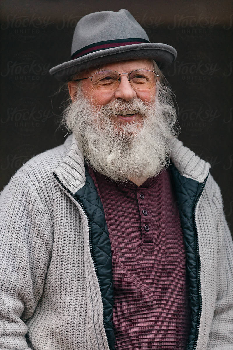 Gray-haired bearded senior man portrait