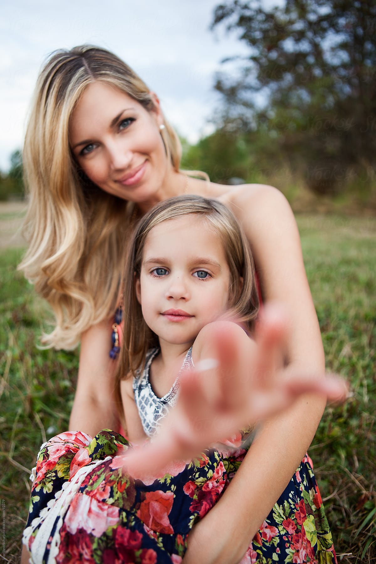 Portrait Of A Mother Carrying Her Daughter By Stocksy Contributor Take A Pix Media Stocksy 