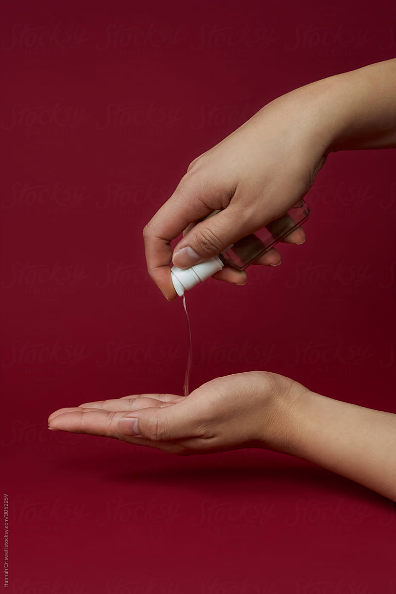 Hand Sanitizer Being Dispensed Into Hand