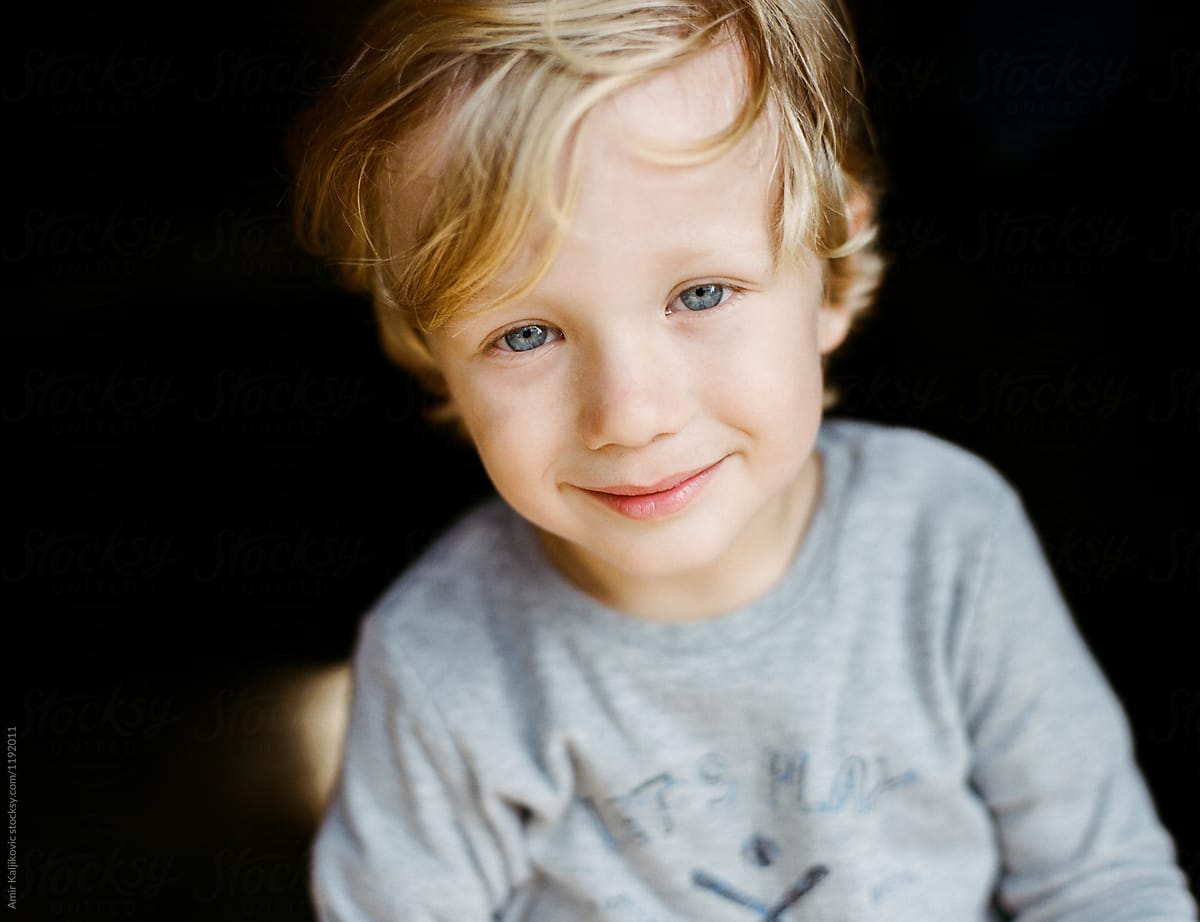 Cute handsome little blond boy