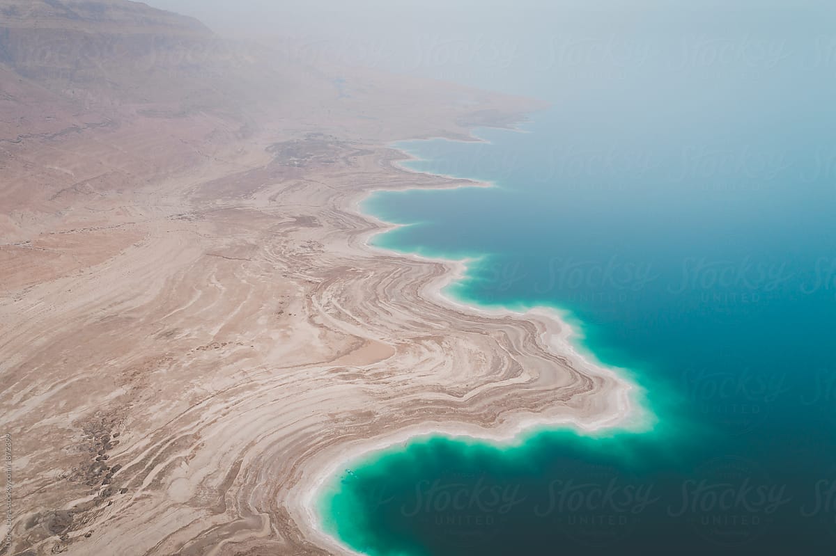 The coast of the dead sea surrounded by desert. Israel