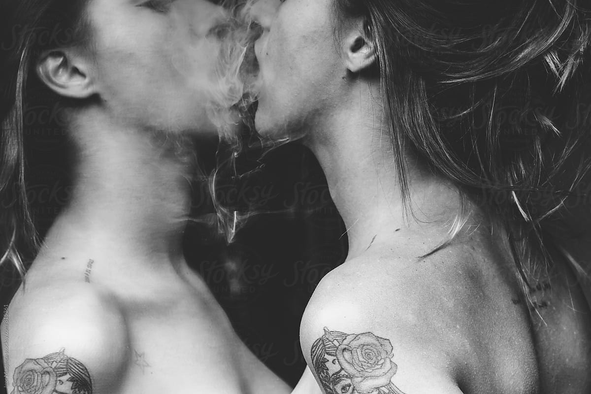 smoke kiss,beautiful tattooed girl in front of mirror